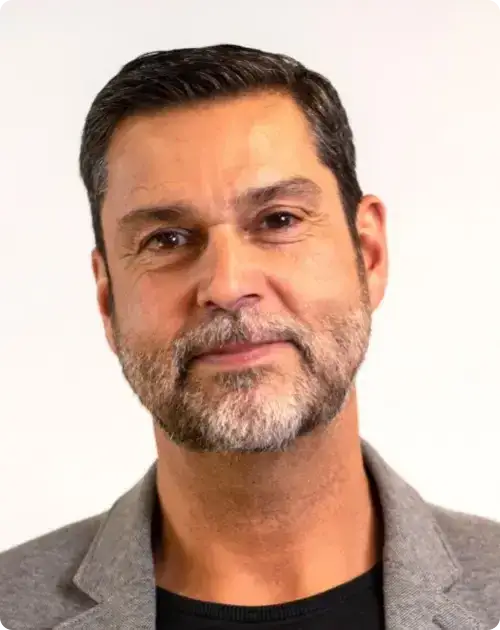 Portrait of Raoul Pal against a white background