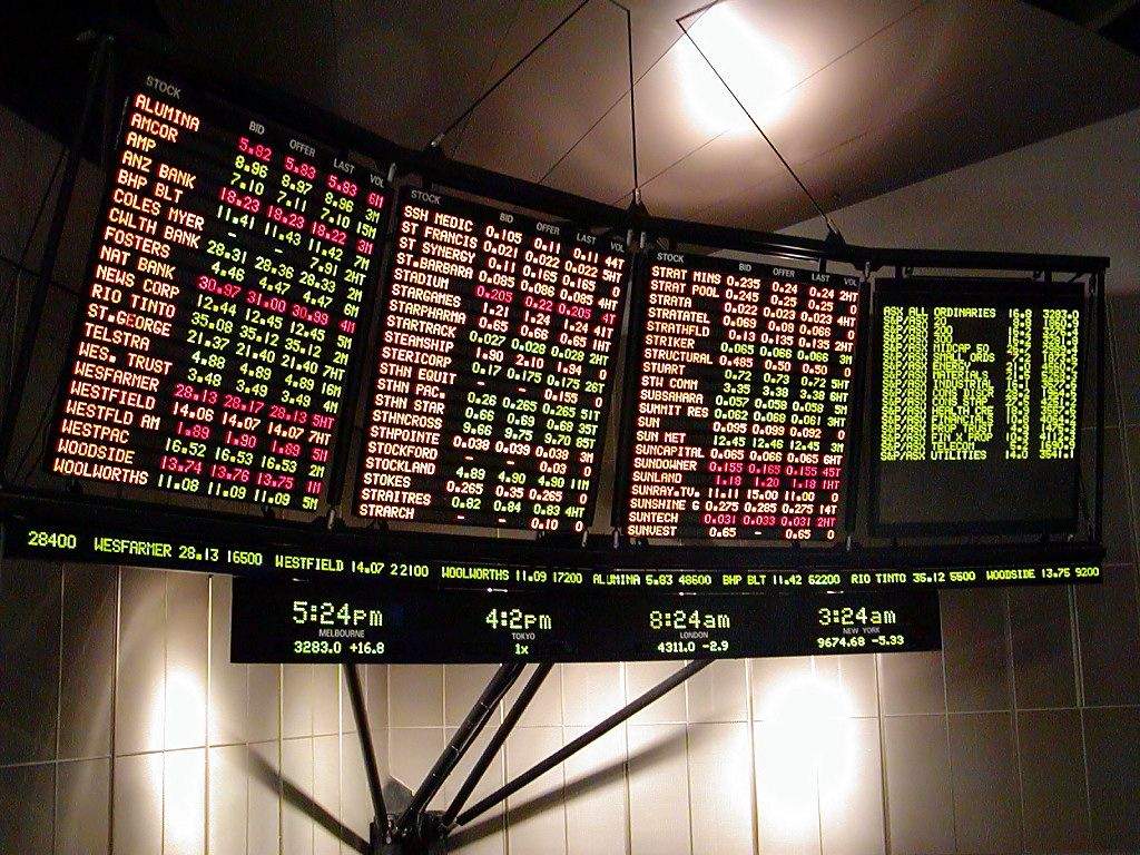 Stocks on four monitors